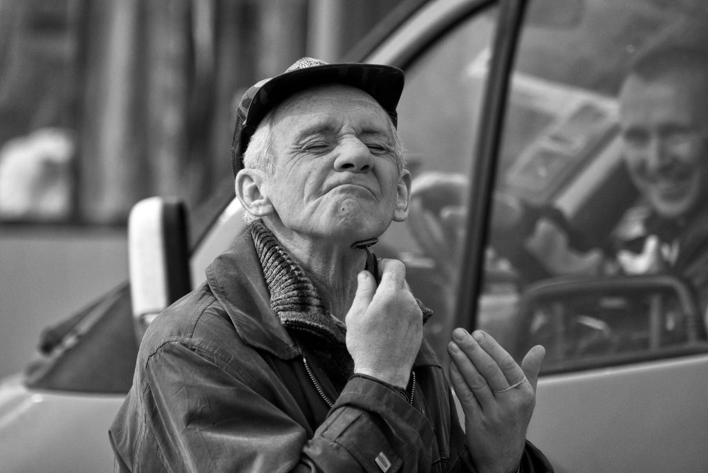 Elderly man shaving